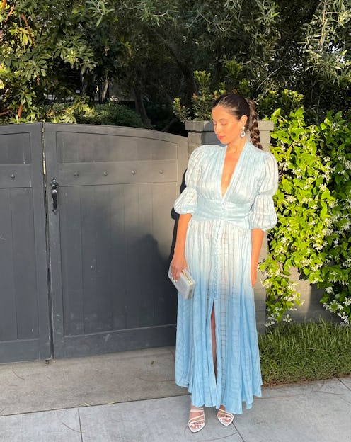 Rebecca Iloulian posing in a light blue romantic dress