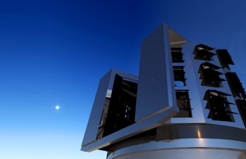 image of an astronomical observatory with the moon in the background