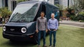 Rivian CEO RJ Scaringe and Amazon CEO Andy Jassy check out the electric delivery vehicle at Amazon's...
