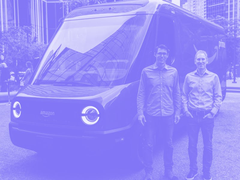 Rivian CEO RJ Scaringe and Amazon CEO Andy Jassy check out the electric delivery vehicle at Amazon's...