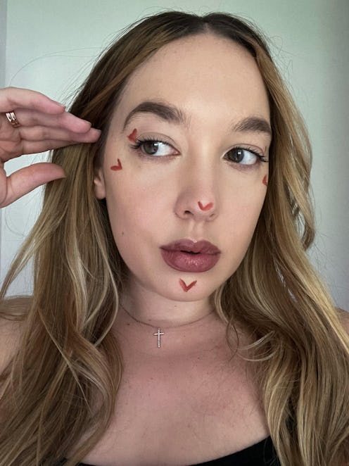 Bustle beauty writer Olivia Rose Ferreiro tries douyin makeup and applies Rare Beauty Soft Pink Liqu...