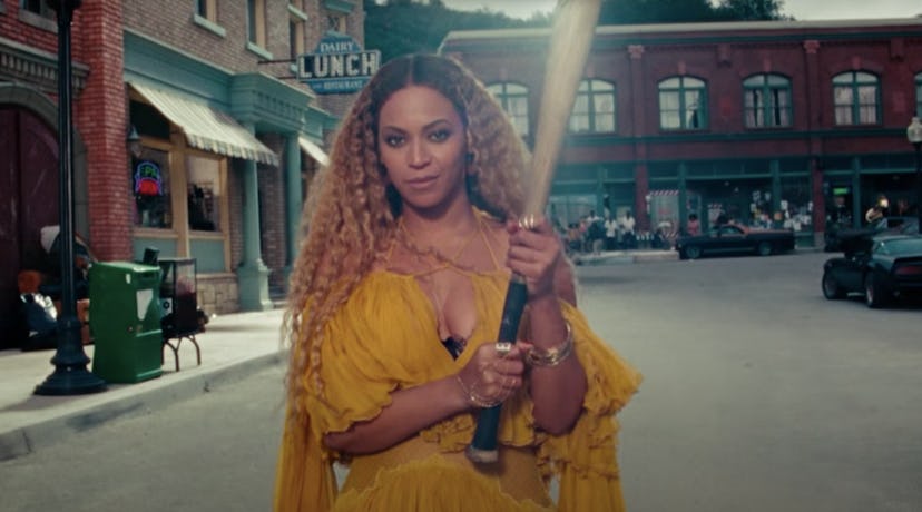 Beyoncé wears long wavy hair in "Hold Up" music video.