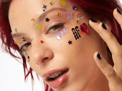 a model wears joystickers from af94, Halsey's new, affordable beauty brand.