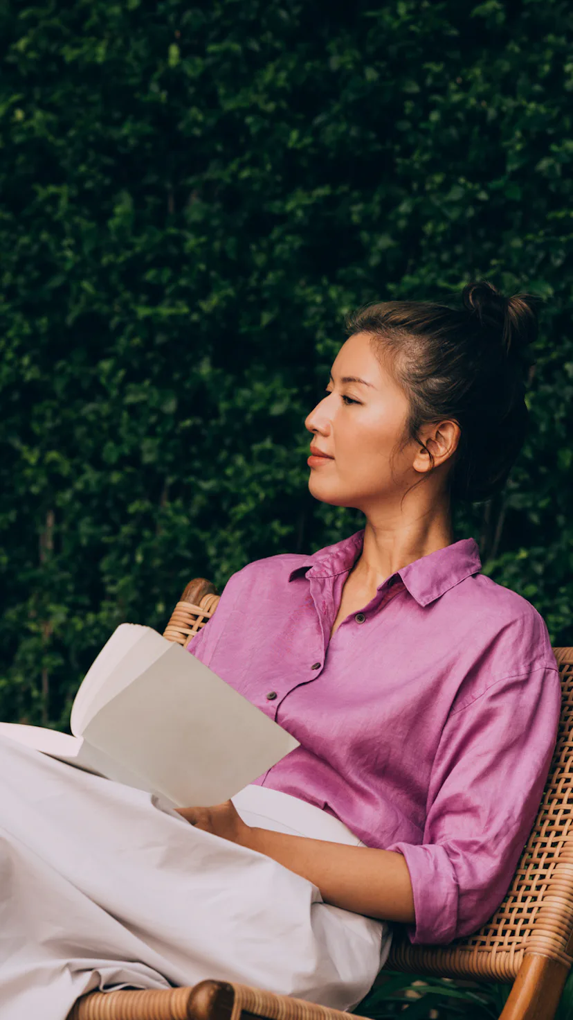 Woman reading a book.