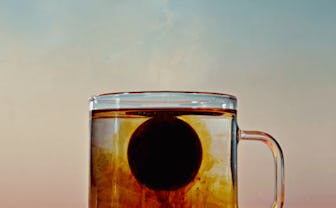 Coffee pod in transparent mug.