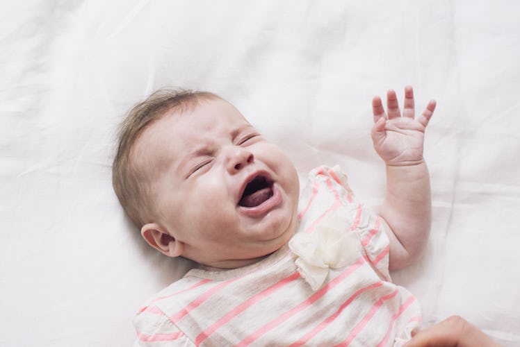 A crying baby.