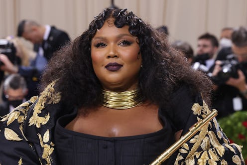 Lizzo's leopard print nail art matches her Yitty bodysuit.