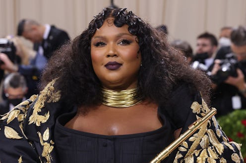 Lizzo's leopard print nail art matches her Yitty bodysuit.