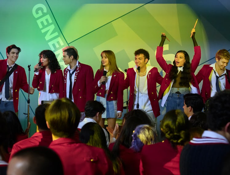 A still from the Rebelde reboot of the cast singing on stage