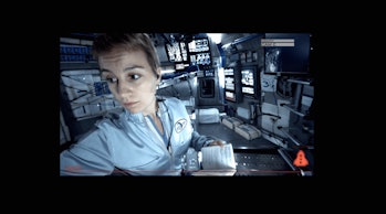 Footage of female crew member inside the spacecraft