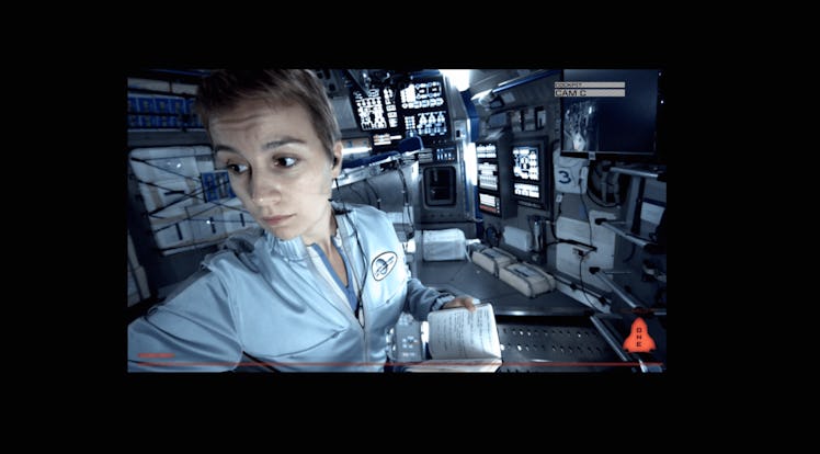 Footage of female crew member inside the spacecraft