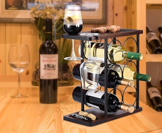 Featuring slots for both bottles and wine glasses, this ALLCENER Wine Rack is one of the best wine r...