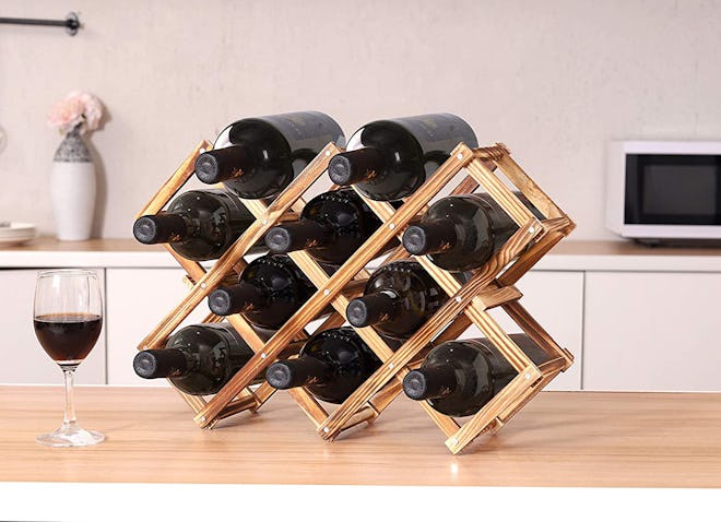 Featuring a collapsible design for easy storage, this PENGKE Wood Wine Rack is one of the best wine ...