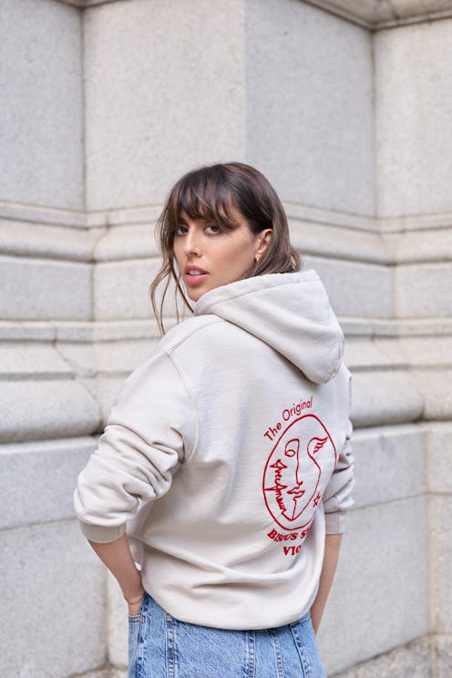 Violette, makeup artist and founder, in her Avec Amour sweatshirt - what french women really wear