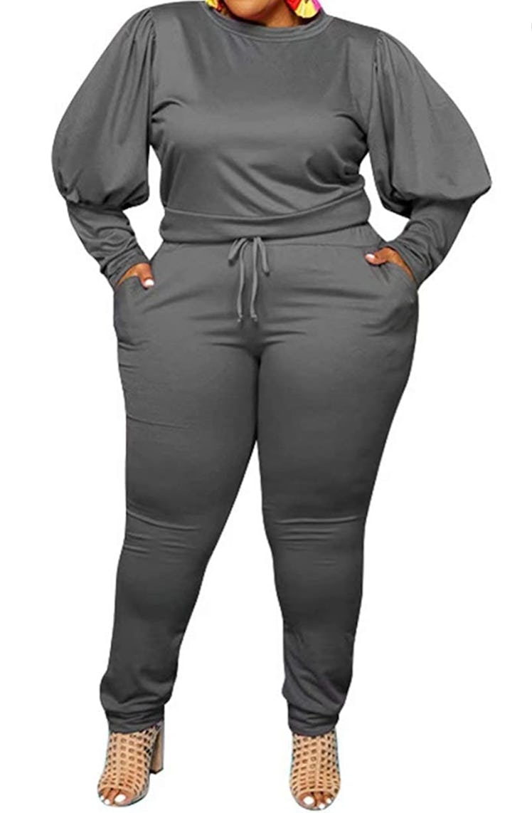 A silvery sweatsuit with a cropped, long sleeve top and joggers.