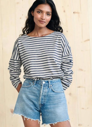 Geraldine Boublil wears a blue and white striped oversized shirt