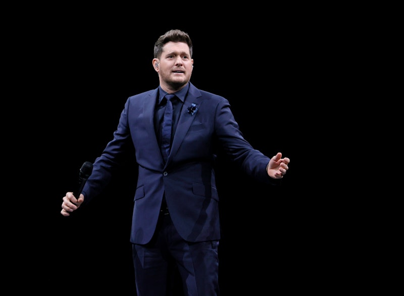 Michael Bublé performing on stage in 2022