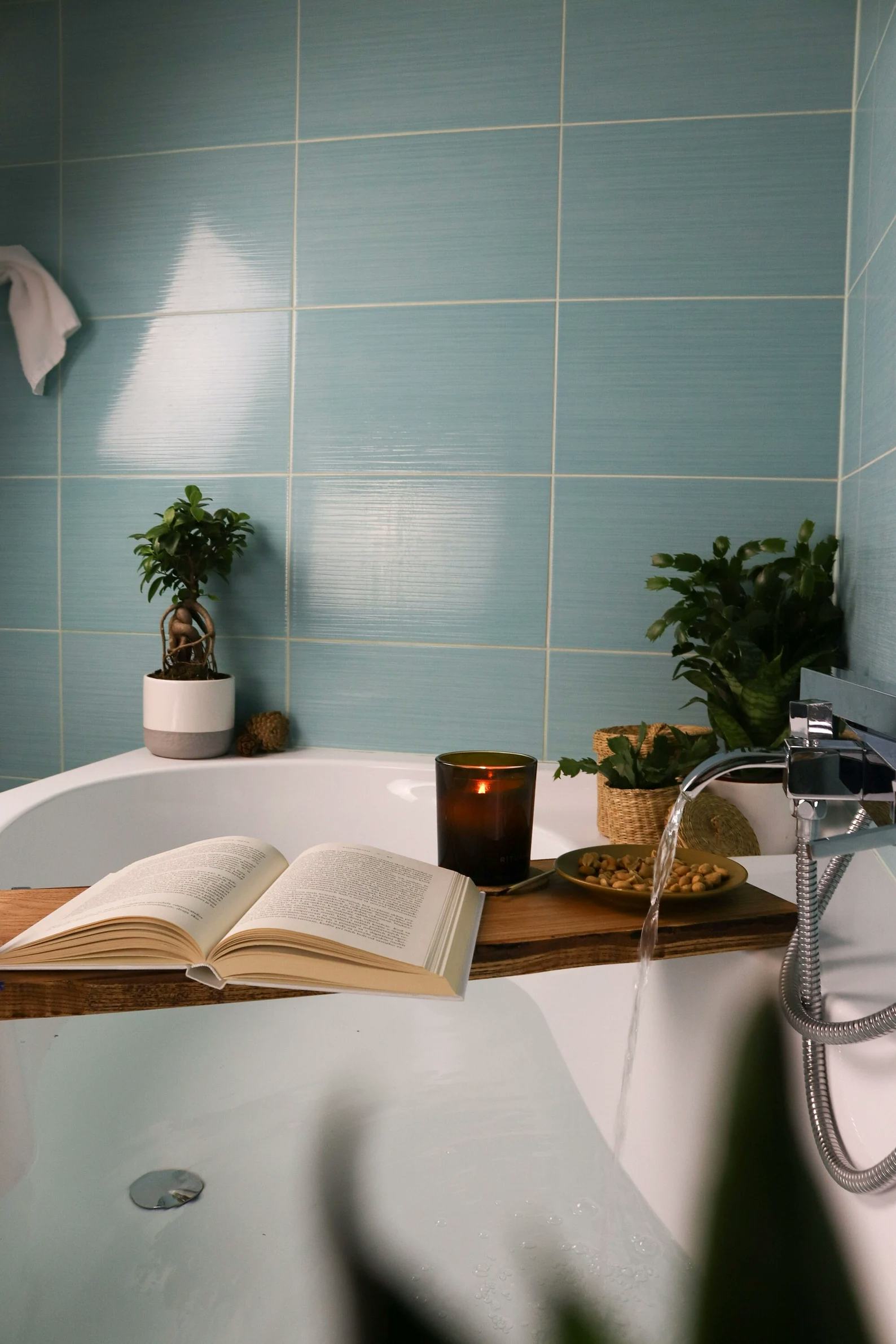 monetto Woodward bath caddy with items atop it