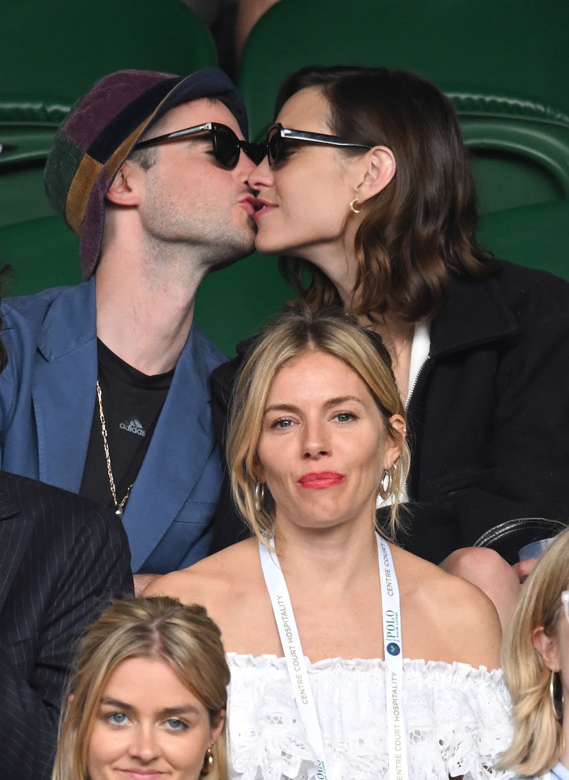 Alexa Chung and Sienna Miller and Tom Sturridge at a tennis match