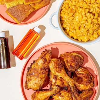 chicken wings, Mac and cheese, and cornbread from Carla hall
