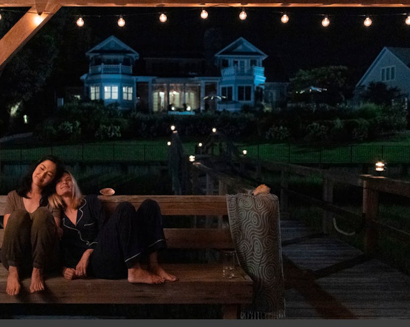 A still from the Summer I Turned Pretty, showing the main character and her mom's friend on a porch ...