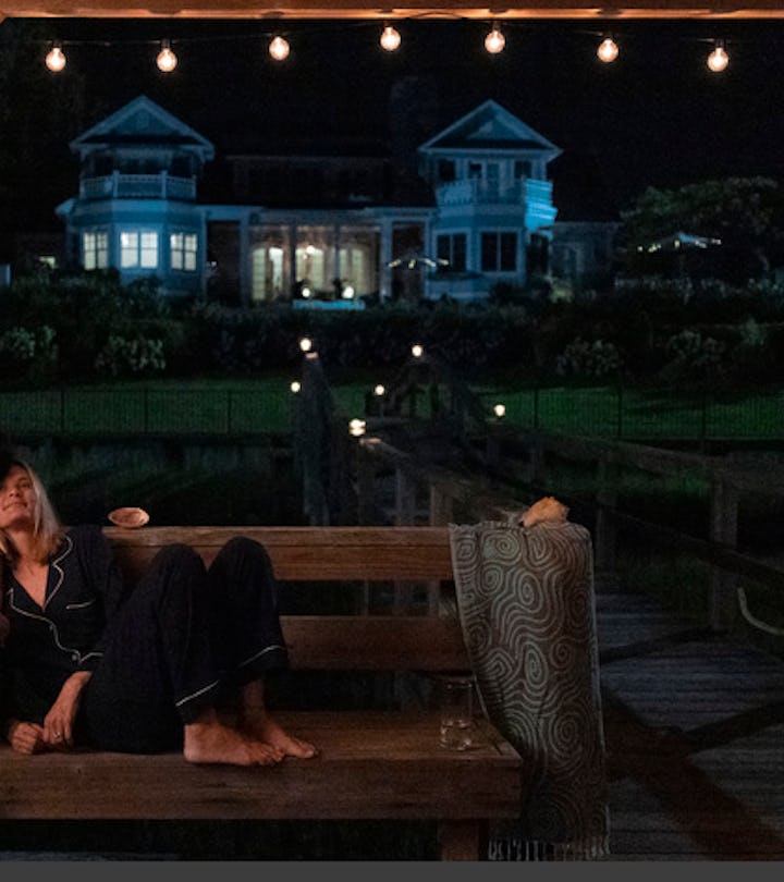 A still from the Summer I Turned Pretty, showing the main character and her mom's friend on a porch ...