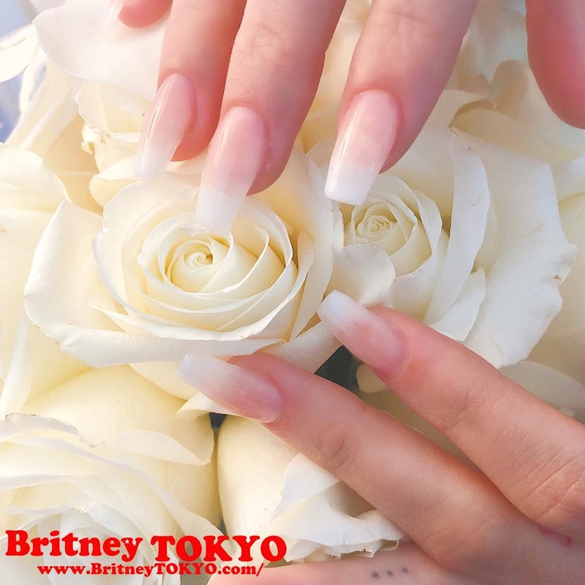 Hailey Bieber’s square-shaped French tips are so ’90s-chic.