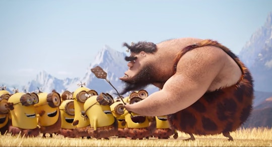 A caveman holds a fly swatter offered by a group of Minions.
