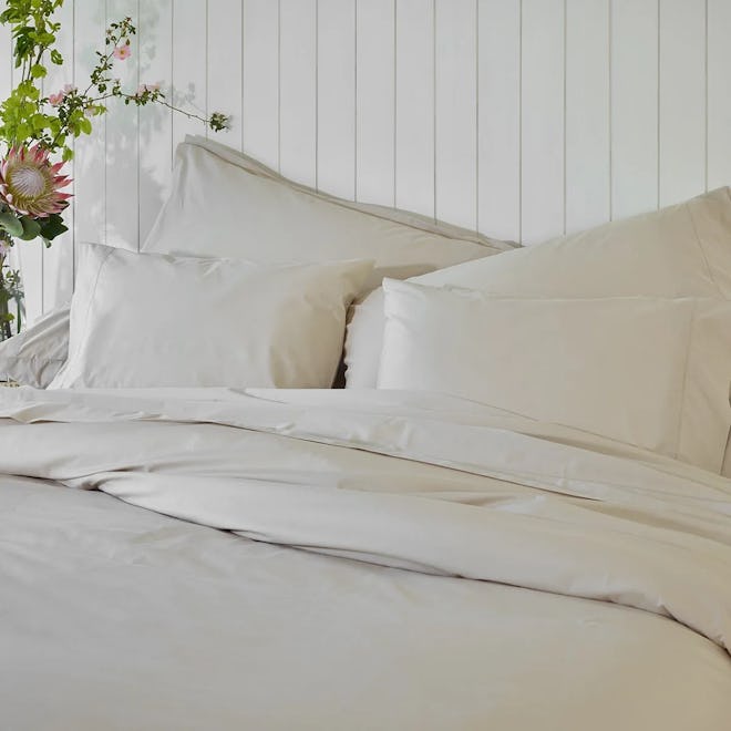made bed of cream percale pillowcase