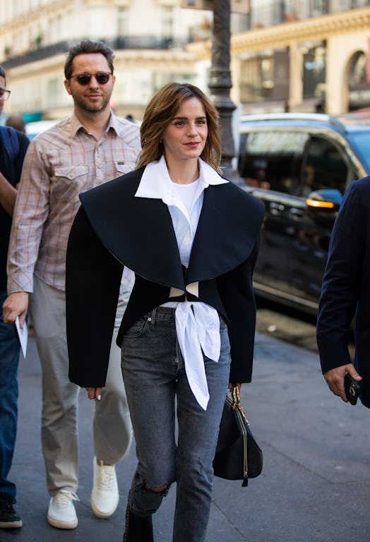 Emma Watson wearing a blazer with oversized shoulders