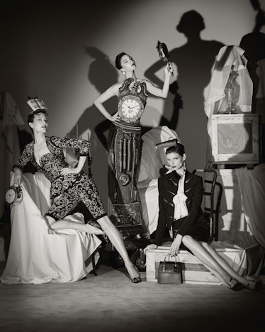 A black-and-white Moschino couture campaign featuring three models