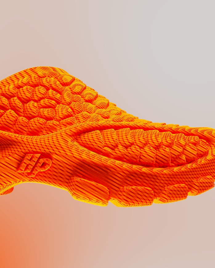 Close-up of Heron Preston Zellerfeld 3D printed sneaker in orange