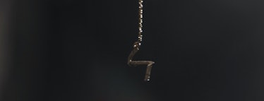 Kamala Khan's broken necklace hangs in the air in Ms. Marvel Episode 5