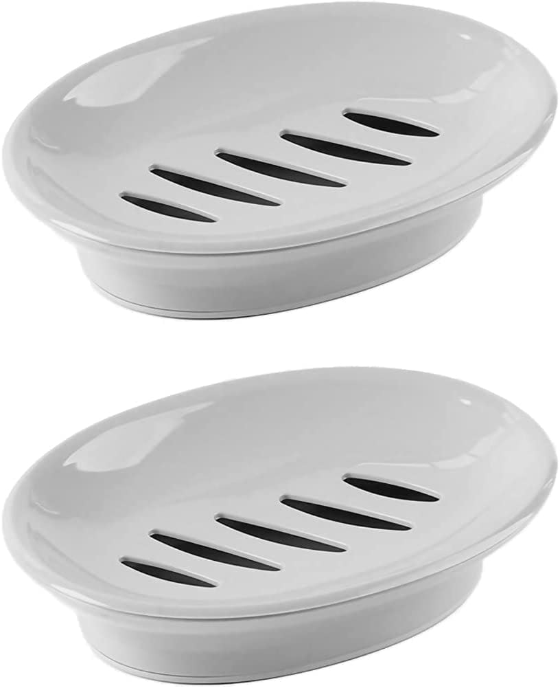 2 white soap dishes with drain