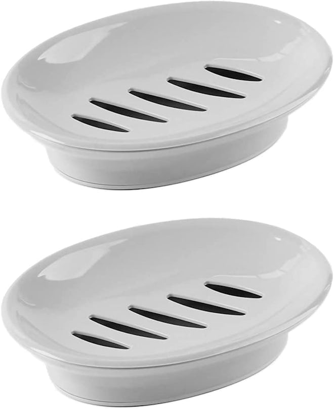 2 white soap dishes with drain 