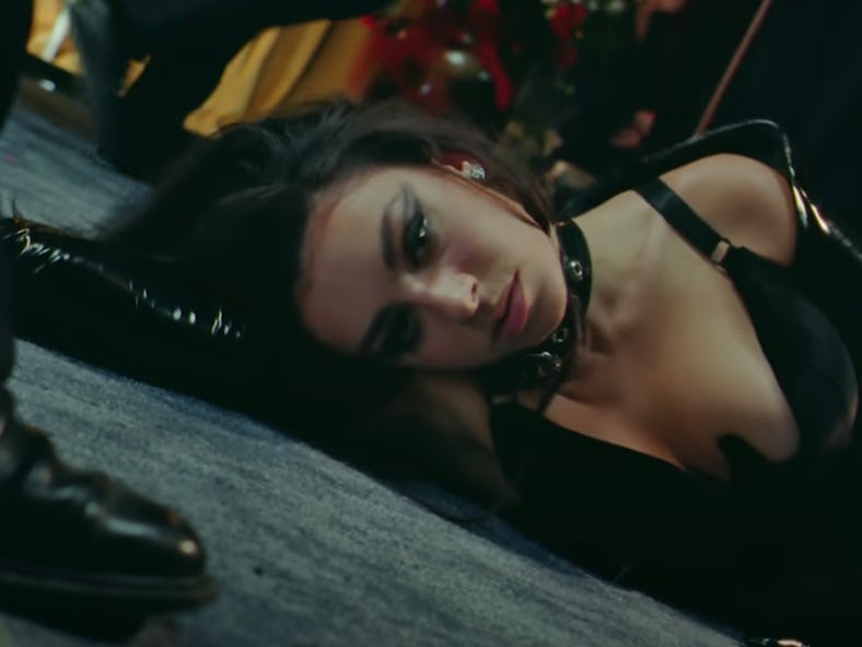 Charli XCX lays on the floor in her "Good Ones" music video 