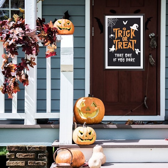 take one halloween sign, lifestyle shot on porch