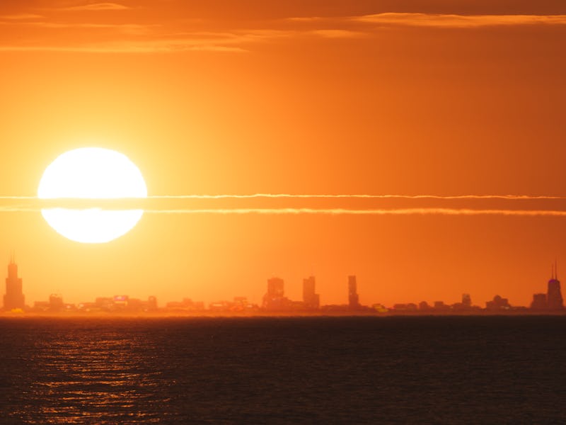 Sun setting over Chicago skyline