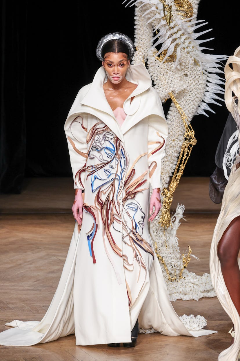 Model Winnie Harlow on the runway in an Iris Van Herpen gown