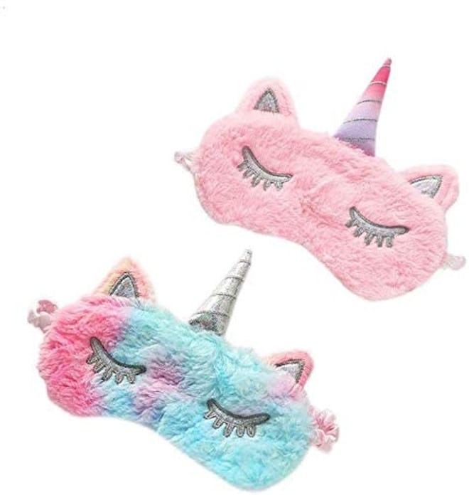 The Quadow Unicorn Sleeping Mask is a product that makes airplane travel with kids easier.