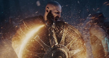 Sparks fly as a blade clashes against Kratos’s shield