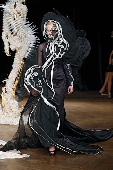 A model walks the runway during the Iris Van Herpen Haute Couture Fall Winter 2022 2023 show as part...