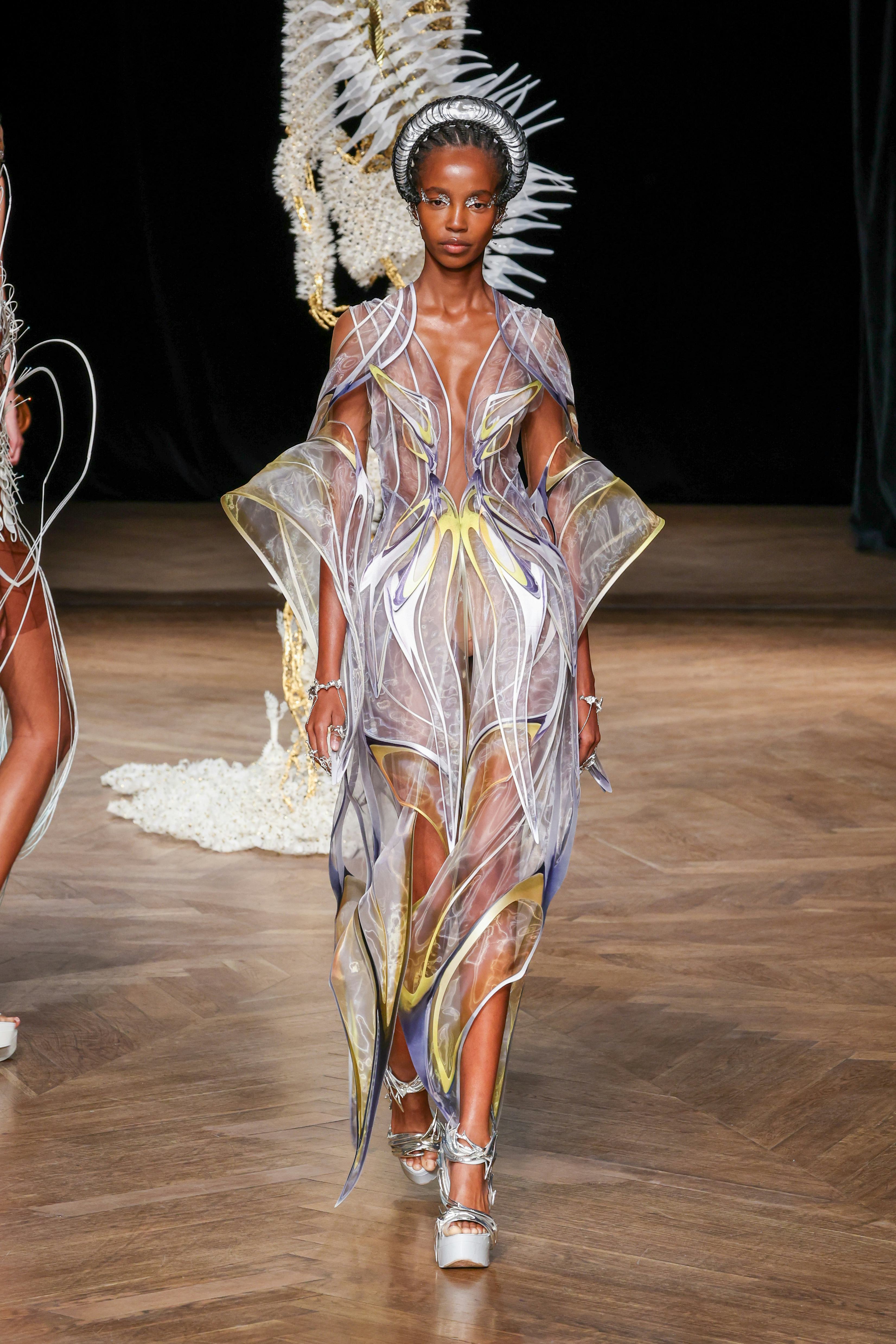 A model walks the runway during the Iris Van Herpen Haute Couture Fall Winter 2022 2023 show as part...