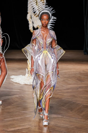 A model walks the runway during the Iris Van Herpen Haute Couture Fall Winter 2022 2023 show as part...