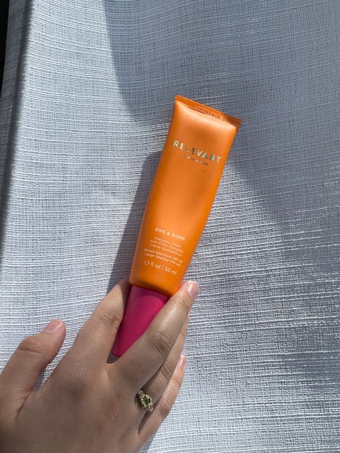 An orange tube of an everyday cream with SPF 40