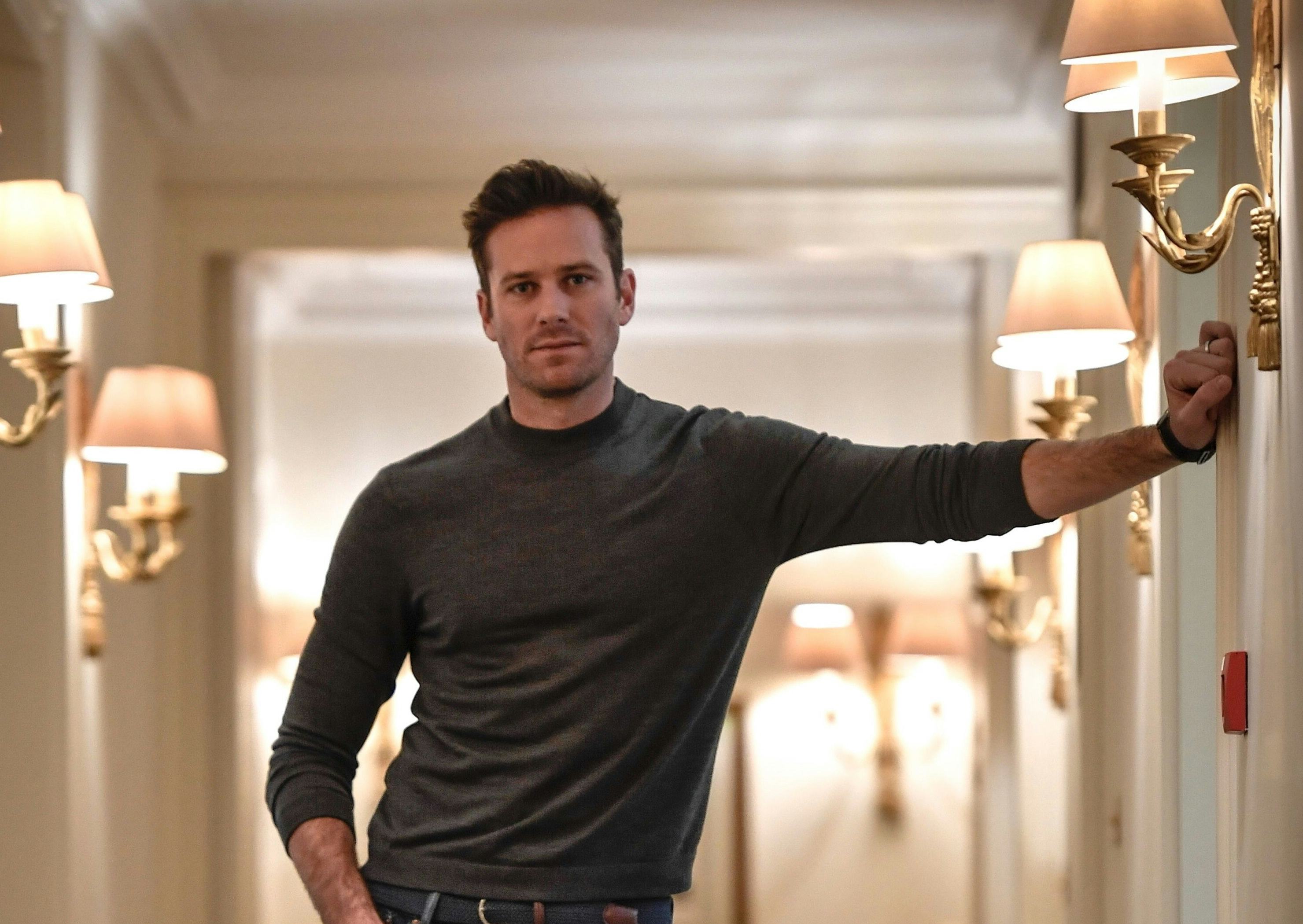 Is Armie Hammer Selling Timeshares Or A Hotel Concierge In The Cayman Islands?