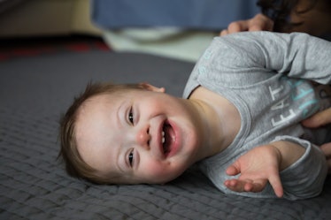 A baby laughing.