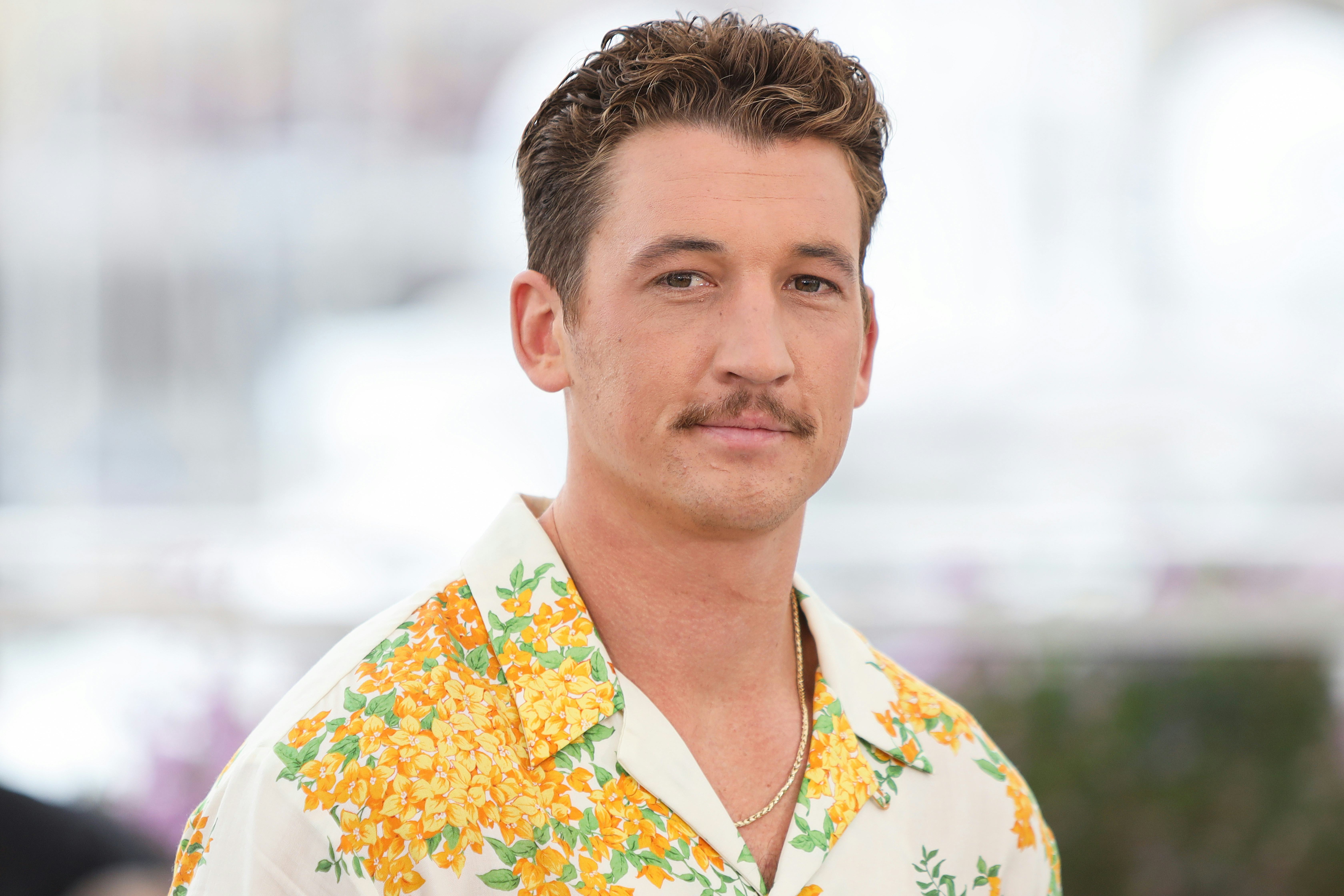 Miles Teller sporting his "Top Gun" mustache