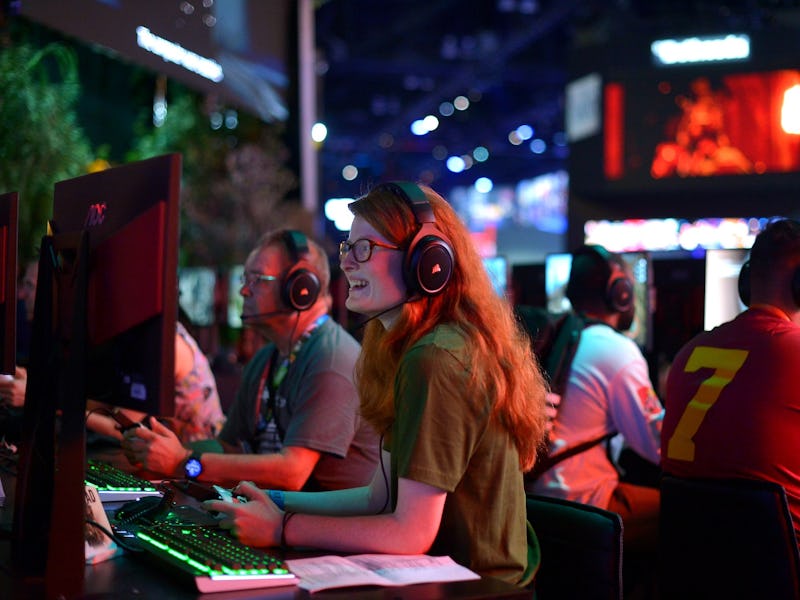 photo of E3 attendees playing game demos