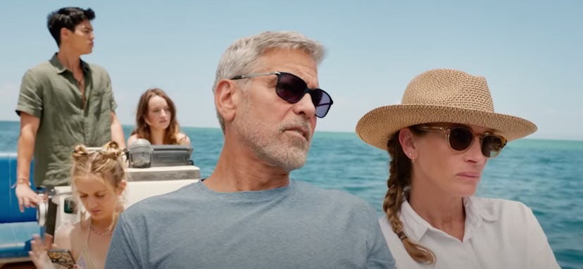 Julia Roberts, George Clooney sitting next to each other on a boat with Kaitlyn Dever, Maxime Boutti...